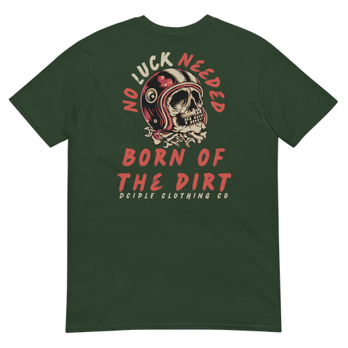 Vintage skull wearing a retro racing helmet with No Luck Needed Born of the Dirt graphic on a forest green T-shirt.