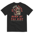 Black Born of the Dirt graphic T-shirt featuring a vintage motocross helmet skull illustration with retro typography on the back