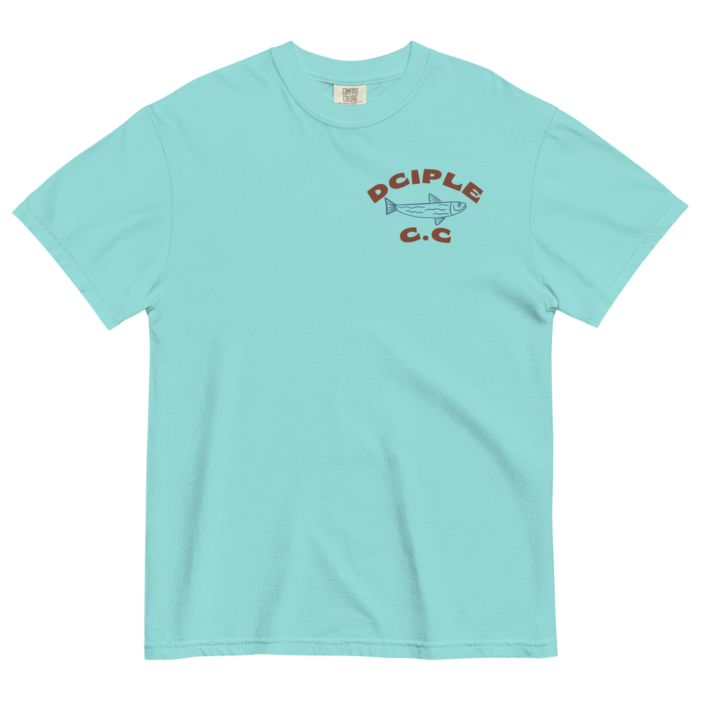 Back graphic of High Tide Division Make It A Destination T-Shirt featuring a skeleton relaxing beneath a palm tree beside an ocean wave.

Front chest logo of High Tide Division Make It A Destination T-Shirt featuring the Dciple C.C. fish emblem.